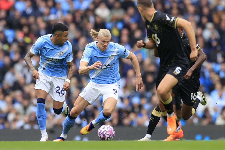Man City go top, Liverpool held, Newcastle stun Tottenham